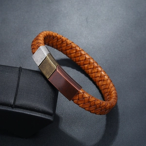 Men's braided brown leather bracelet with a tricolor metallic magnetic clasp detail