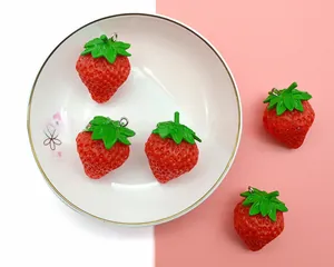 Realistic PVC strawberry charm with seeds and green leaves for DIY keychains