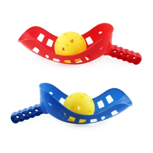 Outdoor scoop ball set for two players with red and blue rackets and yellow balls