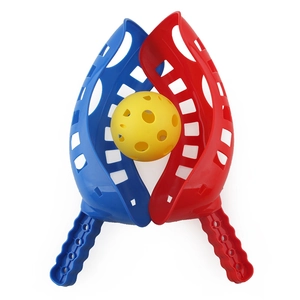 Outdoor catch and toss game set with red and blue rackets and yellow perforated ball