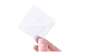 Detail showing a transparent self-adhesive hook base with peeling protective film