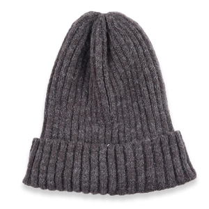Close-up of dark grey knit beanie featuring a thick ribbed weave and rolled edge cuff