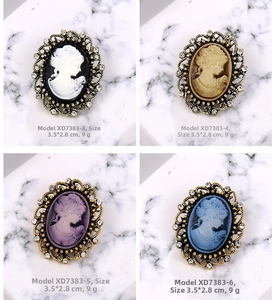 Vue détaillée de broches camée vintage en quatre couleurs avec strass et dimensions