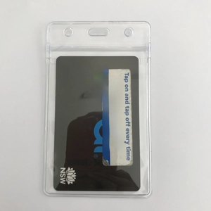 Detailed view of clear PVC badge holder with waterproof seal and triple lanyard holes