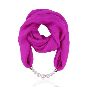 Lightweight purple chiffon scarf necklace with pearl pendant on a clean white background