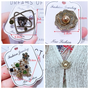 Detailed close-up of vintage alloy brooches with diamonds and pearls showing precise dimensions