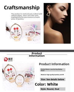 Detailed view of white lace jewelry display stands in round and oval shapes with bamboo frames