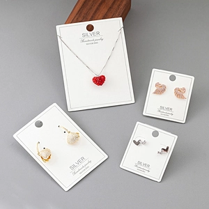 Assorted S925 sterling silver jewelry set on display cards with elegant heart and swan motifs