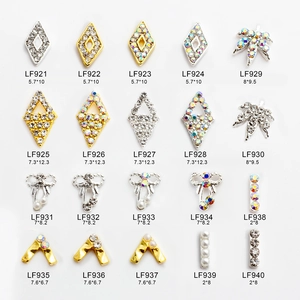 Detailed size chart for various gold and silver metal nail charms in multiple shapes