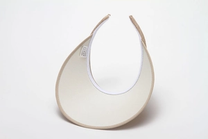 Detail showing the inner lining and washing label of the woven sun visor hat
