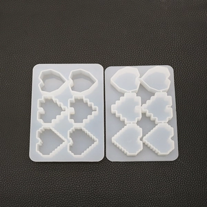 DIY pixel heart silicone mold set for crystal epoxy resin casting on black background