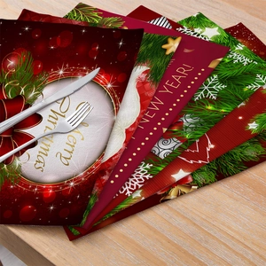 Christmas cotton linen placemat set with festive red motifs and Merry Christmas text