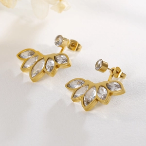 Elegant gold flower earrings with leaf-shaped marquise zircons in a minimalist style