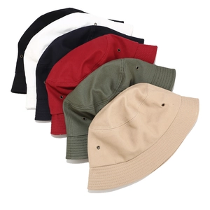 Minimalist canvas bucket hat in six colors with metal eyelets for outdoor sun protection