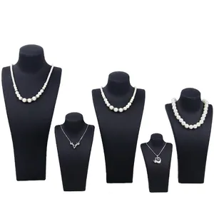 Brushed leather mannequin bust displays for pearl necklaces and animal pendants