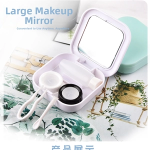 Inside view of a matte purple square contact lens case set with mirror and tools