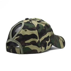 Detail view of the camo cotton ponytail hole and adjustable strap on the baseball cap