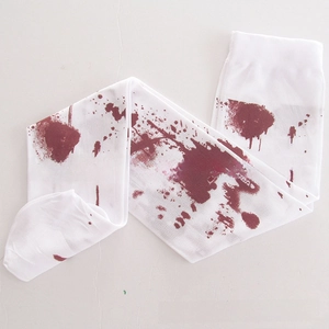 Detail of white over-knee stockings featuring realistic dark red blood splatter pattern