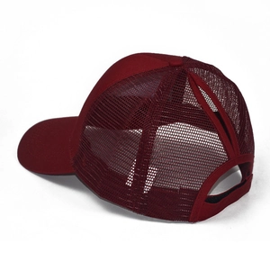 Detail view of burgundy mesh ponytail hat with high opening for hair and adjustable strap