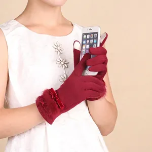 Winter thermal burgundy gloves with faux fur trim and bow detail for touchscreen use