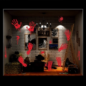 Detailed bloody handprint and footprint decals on glass in a spooky Western-themed setting