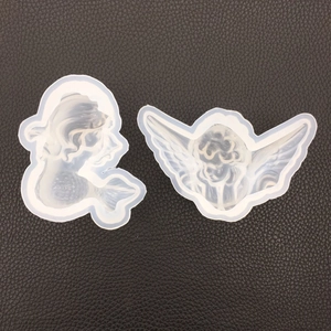 Translucent silicone mold featuring mermaid and winged angel shapes for resin DIY crafts