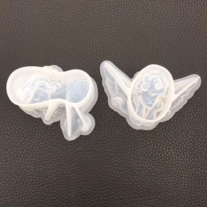 Detailed view of translucent angel silicone molds for resin casting and DIY crafts