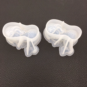 Macro shot of two translucent silicone resin molds for mermaid and angel hair textures
