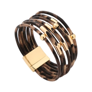 Close-up of leopard print layered bracelet with gold beads and magnetic clasp closure