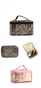 Detailed interior of leopard print makeup bag featuring mirror and organized compartments