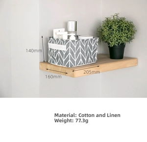Detailed view of grey herringbone cotton linen storage basket with 205x160x144mm dimensions