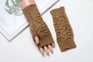 Detail showing khaki cable knit fingerless gloves with soft acrylic texture for winter