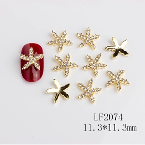 Detail of gold starfish nail charm LF2074 with rhinestones measuring 11.3x11.3mm