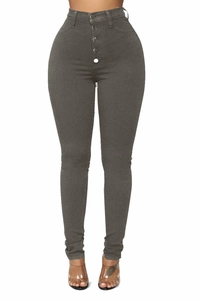 Detail of high waist skinny jeans with multi-button closure in dark grey stretch denim