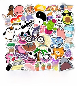 Close-up of waterproof cartoon stickers with panda, corgi, and floral graffiti designs