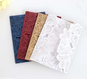 Detailed laser cut floral wedding invitations in navy, burgundy, khaki and white