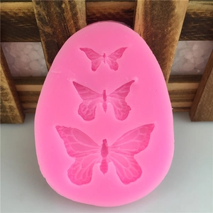 Pink silicone butterfly mold set with three sizes for DIY fondant cake decoration