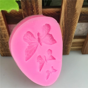 Pink silicone butterfly mold with three different sizes for fondant and cake decoration