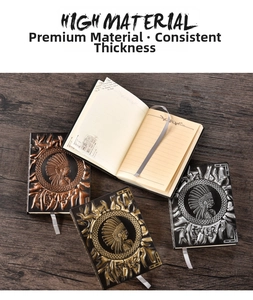 Detailed view of the vintage embossed Indian pattern on the metallic finish PU notebook