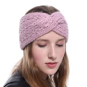 Light pink chunky knit headband with twisted cross design for winter ear protection