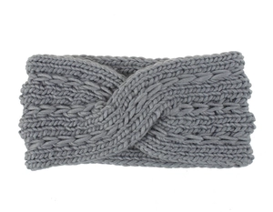 Close-up of gray chunky knit headband with twisted cross knot and warm wool texture