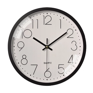Modern 12-inch round wall clock featuring a black frame and minimalist white quartz dial