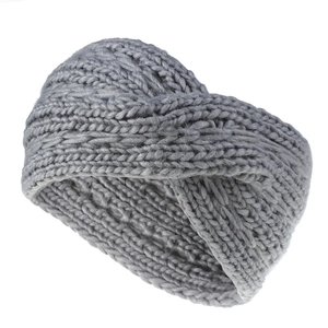 Detailed view of grey thick knit headband featuring cross-knot design and wool texture