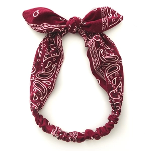 Elastic cotton headband with red paisley pattern and bunny ear bow for women hair styling