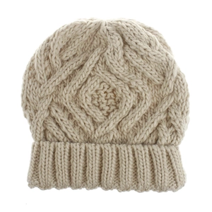 Detailed view of beige knit beanie showing thick cable knit pattern and folded cuff