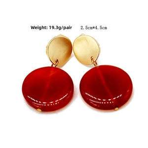 Detail of red resin drop earrings with gold textured studs, weight 19.3g and size 4.5cm