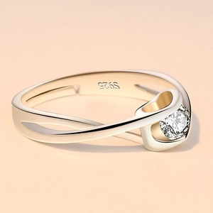 Detail shot of the S925 sterling silver ring featuring a round brilliant-cut gemstone