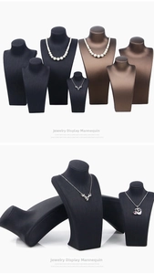 Macro detail of brushed leather mannequin bust stands for professional necklace display