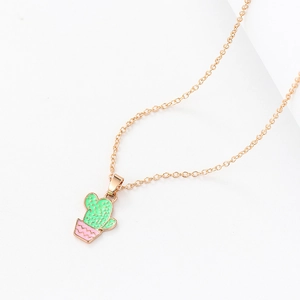 Cartoon green cactus necklace with pink pot pendant and golden chain on white background