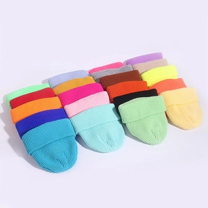 Classic ribbed knit docker caps displayed in a variety of vibrant colors for autumn and winter